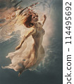Portrait of a girl in a dress underwater 114495692