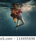 Portrait of a girl in a dress underwater 114495696