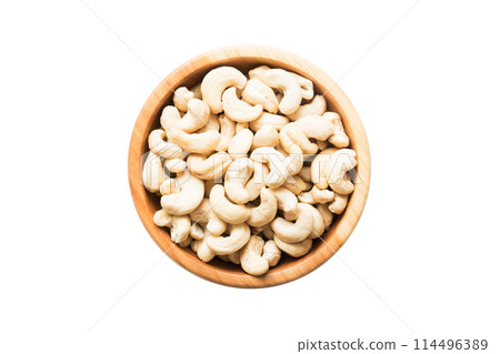Roasted cashew nut in bowl isolated on white background. Cashew nut is snack or raw of cook. Healthy food concept Roasted cashew nut in bowl isolated on white background. Cashew nut is snack or raw of cook. Healthy food concept 114496389