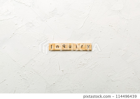 inquiry word written on wood block. inquiry text on table, concept 114496439