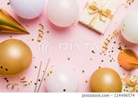 Flat lay party decoration concept on pastel colored background from above. Love concept. Holiday celebration. Valentine Day or birthday party decoration 114496574
