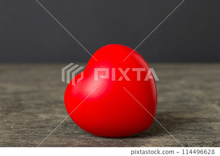 gift box with red bow and red heart on colored background. Perspective view. Flat lay 114496628