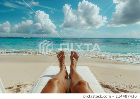 Relaxing beach day: sunbathing on tropical sands Relaxing beach day: sunbathing on tropical sands 114497430