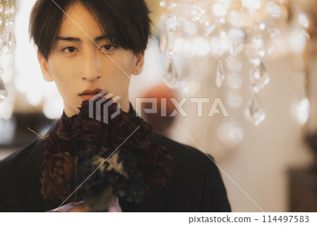 Man in black suit Man in black suit 114497583