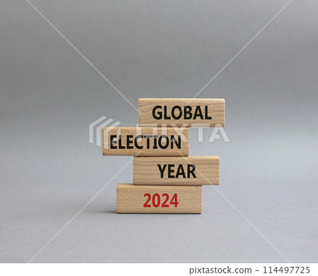 Global Election year 2024 symbol. Concept words Global Election year 2024 on wooden blocks. Beautiful grey background. Business and Global Election year 2024 concept. Copy space Global Election year 2024 symbol. Concept words Global Election year 2024 on wooden blocks. Beautiful grey background. Business and Global Election year 2024 concept. Copy space 114497725