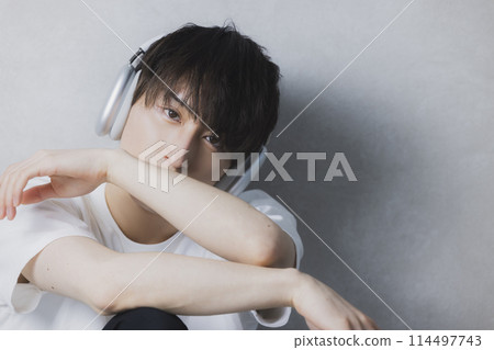 Man in white t-shirt Man in white t-shirt 114497743
