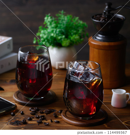 Iced coffee on barnwood background Iced coffee on barnwood background 114499367