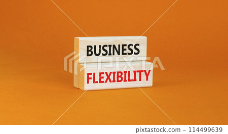 Business flexibility symbol. Concept words Business flexibility on beautiful wooden block. Beautiful orange paper background. Business flexibility concept. Copy space. 114499639