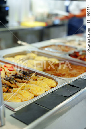 Variety of Food Displayed on Buffet Table 114499784