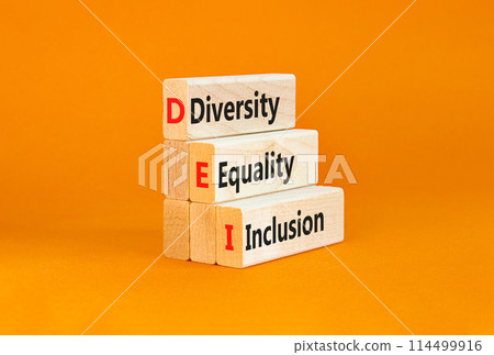 DEI diversity equality inclusion symbol. Concept words DEI diversity equality inclusion on blocks. Beautiful orange background. Business DEI diversity equality inclusion concept. Copy space. 114499916