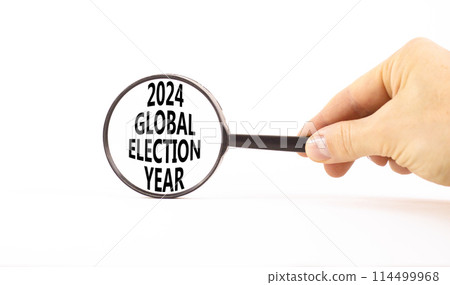 2024 global election year symbol. Concept words 2024 global election year on beautiful magnifying glass. Beautiful white background. Voter hand. Business 2024 global election year concept. Copy space 114499968