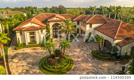 Luxurious suburban mansion at sunset 114500399