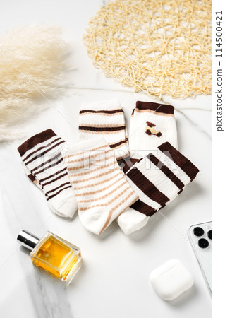 Striped socks for kids on white background 114500421