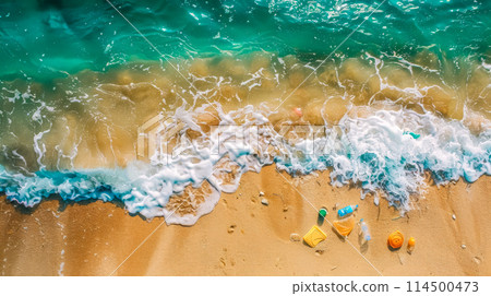Aerial view of pristine beach with colorful toys 114500473