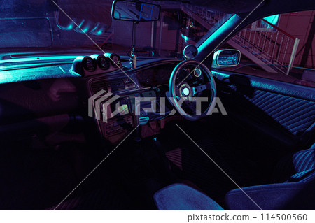 The Interior of a Car With Blue Lights 114500560