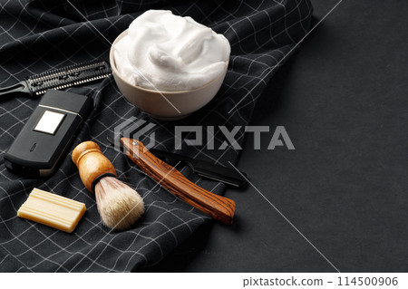 Traditional Wet Shaving Gear Arranged on a Dark Background With Morning Light 114500906