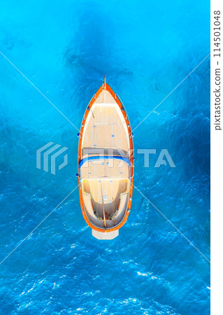 Drone view of a motor boat. Sea transportation. Vacation and holidays. Drone view of a motor boat. Sea transportation. Vacation and holidays. 114501048