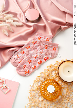 Pink socks with pattern on white background Pink socks with pattern on white background 114501409
