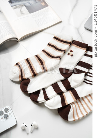 Composition with stylish socks on white background Composition with stylish socks on white background 114501473