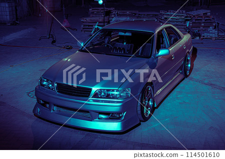 Silver Car Parked in Front of Building 114501610