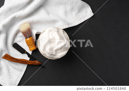 Traditional Wet Shaving Gear Arranged on a Dark Background With Morning Light 114501848