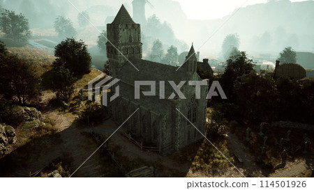 An old Church in a mystical fog 114501926