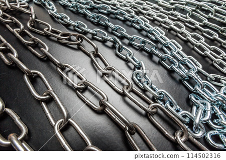 chains on a black background chains on a black background 114502316