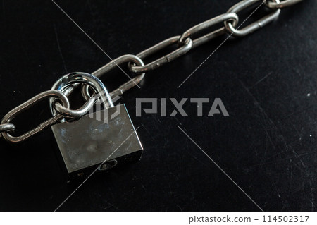 chains on a black background chains on a black background 114502317