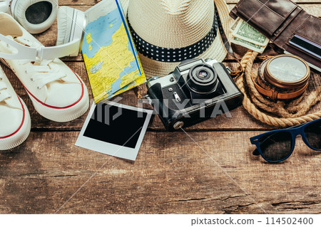 Set of trip stuff on wooden background 114502400