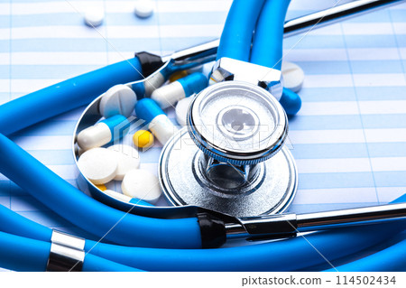 Empty prescription lying on table with stethoscope Empty prescription lying on table with stethoscope 114502434