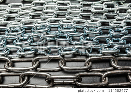 chains on a black background 114502477
