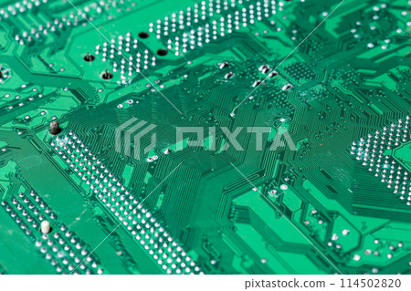 Close up of a printed green computer circuit board 114502820
