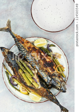 Roasted mackerel with asparagus. 114503549