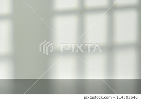 Wall with shadow pattern for product presentation Wall with shadow pattern for product presentation 114503646