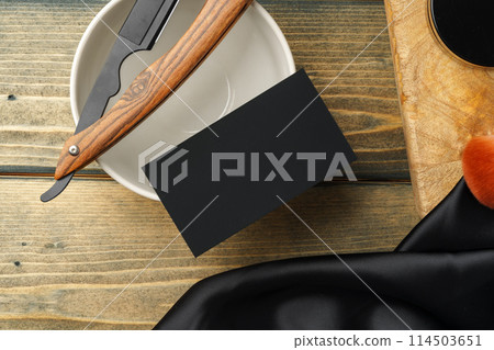 Set of professional barber tools on wooden table Set of professional barber tools on wooden table 114503651