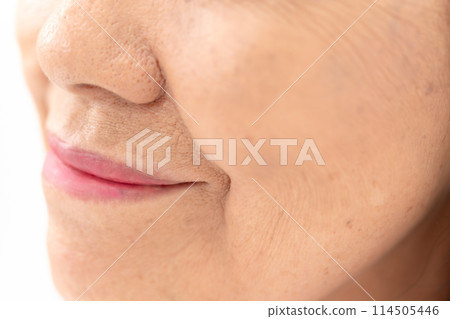 Senior woman nasolabial folds Senior woman nasolabial folds 114505446