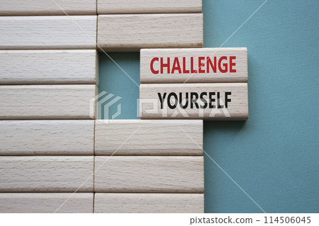 Challenge yourself symbol. Wooden blocks with words Challenge yourself. Beautiful grey green background. Business and Challenge yourself concept. Copy space. 114506045