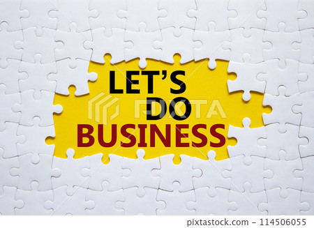 Lets do business symbol. Concept words Lets do business on white puzzle. Beautiful yellow background. Business and Lets do business concept. Copy space. 114506055