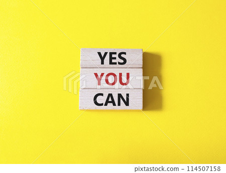 Yes You Can symbol. Concept word Yes You Can on wooden blocks. Beautiful yellow background. Business and Yes You Can concept. Copy space. 114507158