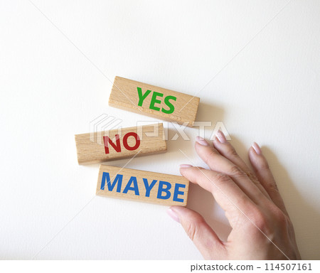 Yes No Maybe symbol. Concept word Yes No Maybe on wooden blocks. Beautiful white background. Businessman hand. Business and Yes No Maybe concept. Copy space. Yes No Maybe symbol. Concept word Yes No Maybe on wooden blocks. Beautiful white background. Businessman hand. Business and Yes No Maybe concept. Copy space. 114507161
