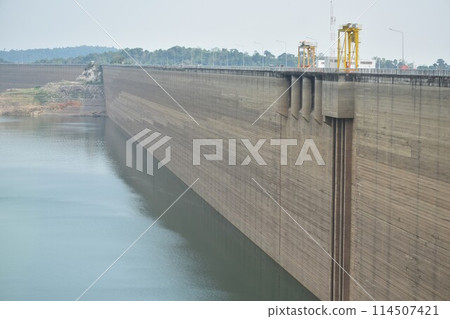Khun Dan Prakarn Chon huge concrete dam with lower water level from El nino effect in Thailand   114507421