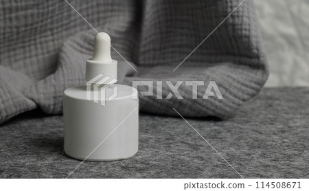 Daily, beauty care cosmetic. scin care .serum . on gray background Daily, beauty care cosmetic. scin care .serum . on gray background 114508671