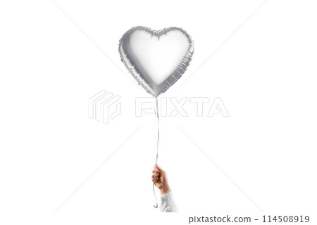 Hand holding blank silver heart balloon mockup, isolated 114508919