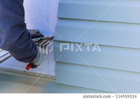 House exterior plastic siding was process replacement on exterior wall House exterior plastic siding was process replacement on exterior wall 114509314