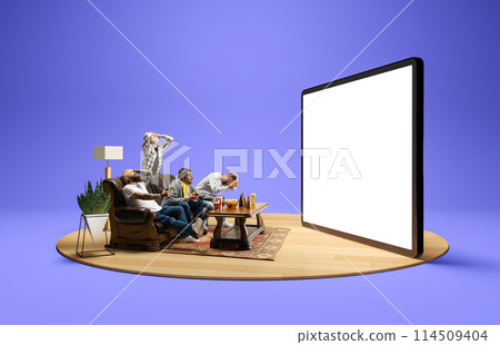 Losing game. Emotional men sitting on couch at home, with beer and snacks, emotionally watching online match translation on 3D TV screen 114509404
