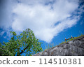 Stone walls, blue sky and white clouds 114510381