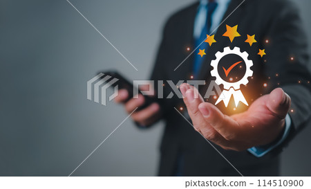 Quality Assurance Concept, Human shows the sign of the top service Quality, Guarantee, Standards, ISO certification and standardization concept, five stars, excellence service, high quality. 114510900