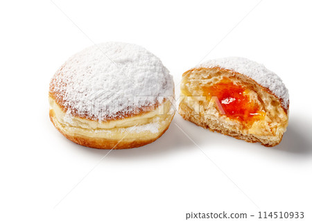 Doughnuts with apricot jelly, sprinkled with powdered sugar Doughnuts with apricot jelly, sprinkled with powdered sugar 114510933