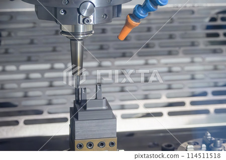 The CNC milling machine cutting the graphite electrode parts. The CNC milling machine cutting the graphite electrode parts. 114511518