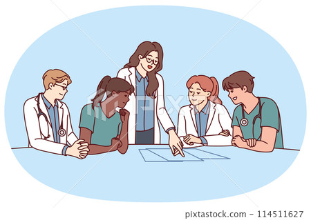 Clinic staff meeting, with doctors sitting at table and head physician giving instructions Clinic staff meeting, with doctors sitting at table and head physician giving instructions 114511627